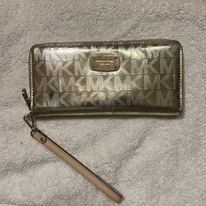 Gold Michael Kors wristlet wallet